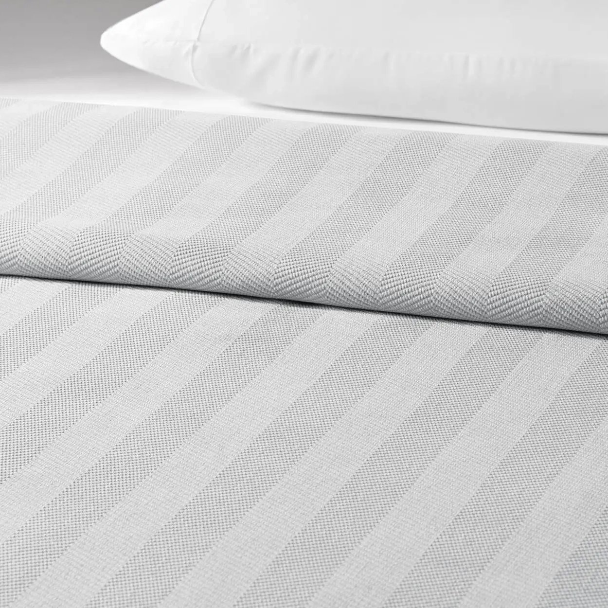 Bedspread-ChenilleHerringbone-OnBed-main.jpg