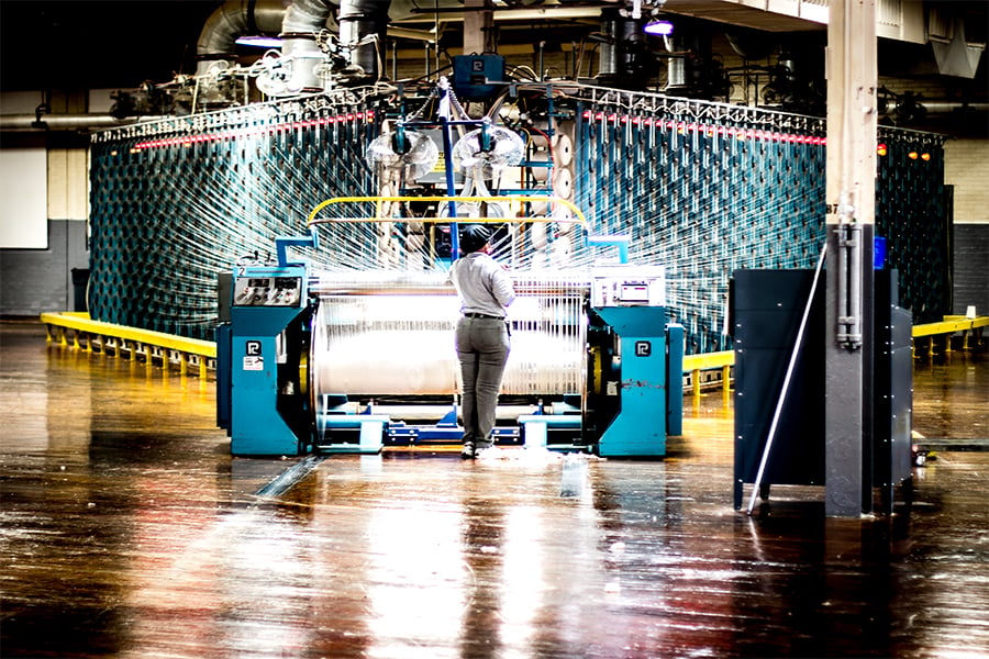 Image of the smiling hispanic associate in our Thomaston, GA. It is a great place to work if you're looking for manufacturing jobs in Georgia.