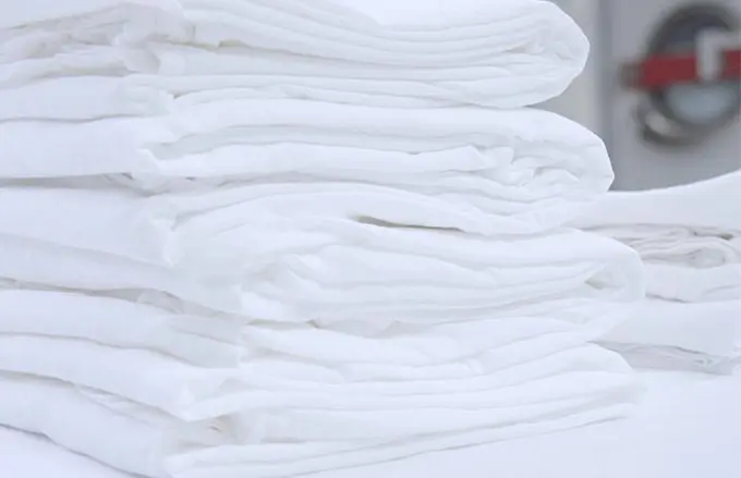 Stack of towels in hotel laundry