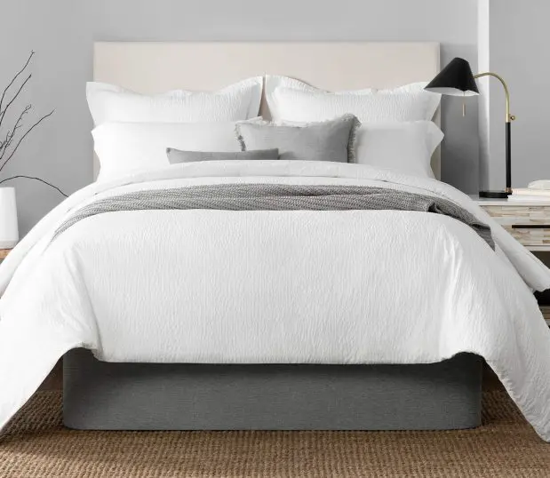 Image of the Circa Bed Wrap shown here in Graphite. The Circa Bed Wrap gives a modern expression of the tired, messy bedskirt.