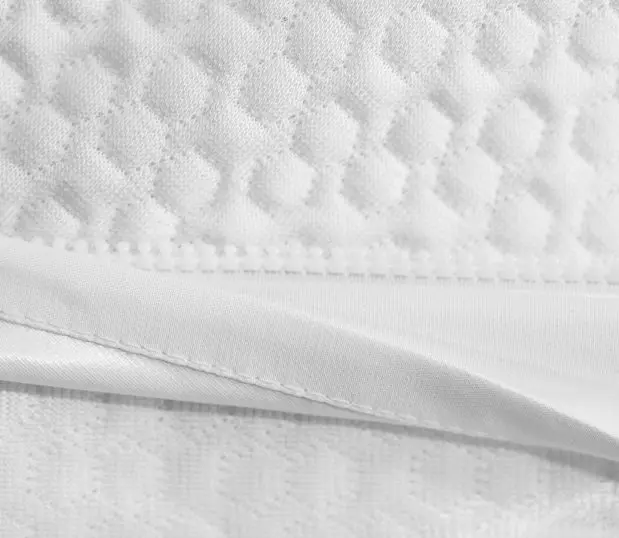 Detail of zipper for AllerEase Platinum Plus Mattress Encasement. This mattress encasement protects against bed bugs, dust mites, allergens, spills, and microbes.