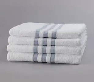 A stack of 4 hospital towels with a 3-Stripe design are pre-laundered, eliminating the need for up-front processing.