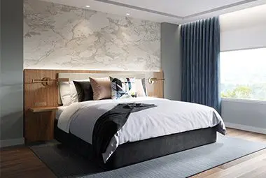 Custom wallcovering in a hotel room above the bed.