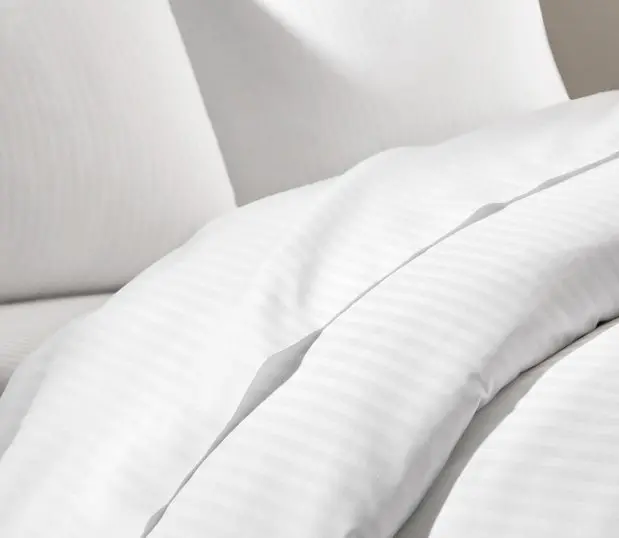 This subtly striped duvet cover delivers hotel quality comfort and durability. Shown here: a detail shot of a striped ComforTwill duvet.