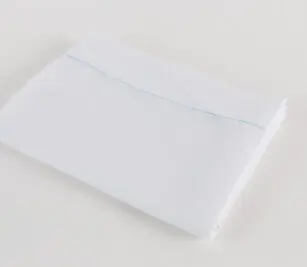 100% Polyester Hospital Sheets for hospitals and health systems. Woven polyester flat sheet folded and shown in Bleached White.