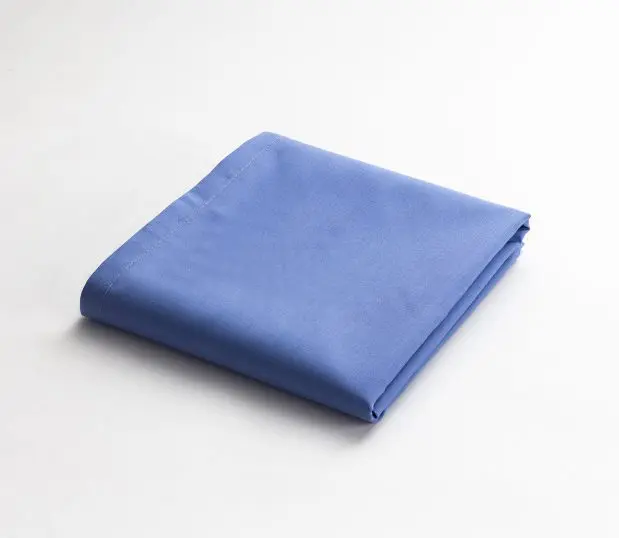 100% Cotton Vat-dyed Woven Pillowcase folded and featured in the color Ceil Blue. Pillowcase size 42x30.