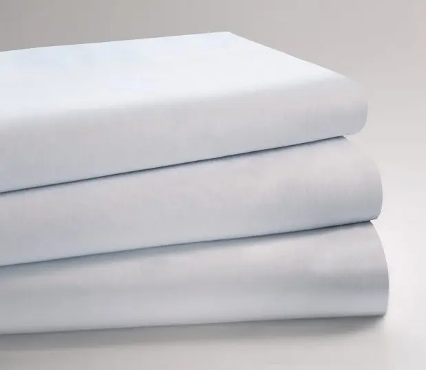 Standard Supreme Woven Sheeting healthcare bedding for hospitals and health systems. Shown in a folded stack in the color White.