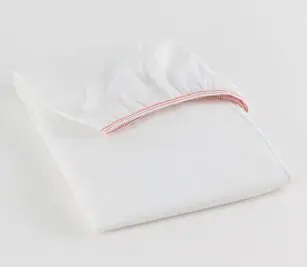 Standard Value Percale Sheets for hospitals and health systems for healthcare bedding. Folded contour sheet shown in Bleached White.