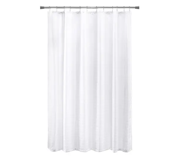 Full length silhouette of white shower curtain in the Bay Blocks pattern.