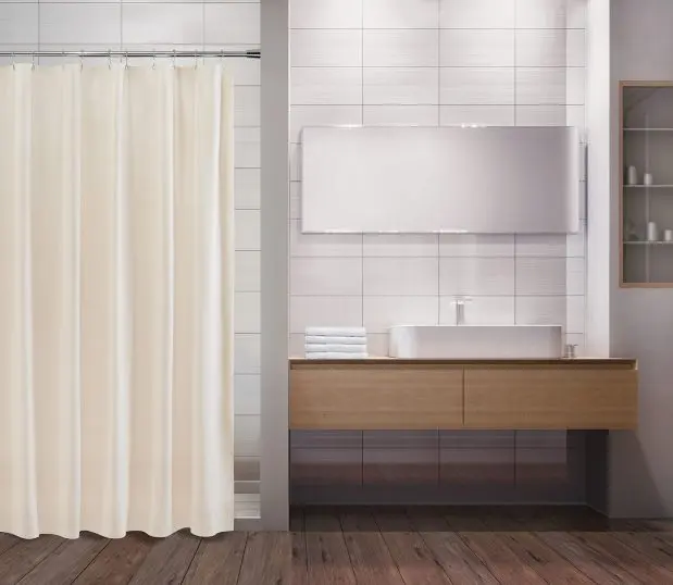 Beige shower curtain in Cruise Vinyl shown here in a modern bathroom.