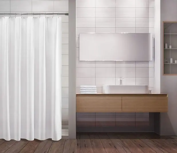 White shower curtain in Cruise Vinyl White seen here in a modern bathroom.