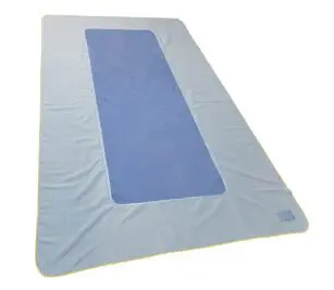 Image of the XTR Back Table Cover shown flat. Our reusable XTR Back Table Cover is commonly used on surgical tables or as the inner wrapper of a surgical pack.