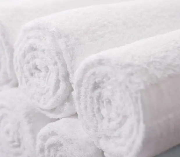 Shown here: a detail shot of rolled classic cam bath towels.