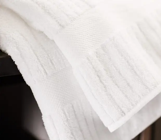 Detail of the Luxury Stripe Towel showing it's decorative dobby.