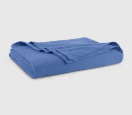 Thermal Blanket Perval Herringbone shown folded in blue.