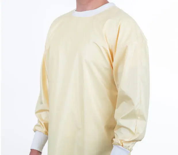 Image of the front of a yellow ComPel® Reusable Isolation Gown.