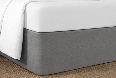 A detail shot of a hotel bed featuring a Circa Bed Wrap.