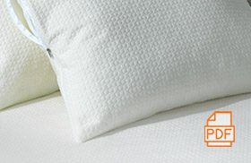 A detail shot of a pillow protected with an AllerEase pillow protector.