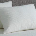 Two AllerEase Platinum Pillow on a Bed.