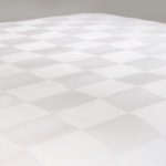 Close-up photo of Brix pattern Centium Satin Sheets