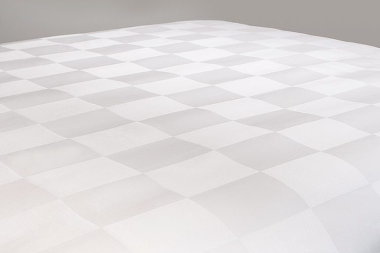 Close-up photo of Brix pattern Centium Satin Sheets