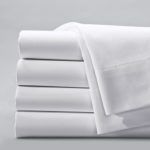 a stack of four centima hospitality sheets