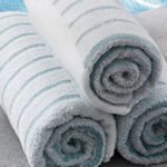 A stack of rolled ColorFill Pool Towels.
