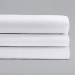 Stack of three ComforTwill Sheets in microcheck, solid, and stripe