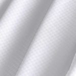 Close up image of ComforTwill hotel sheets in microcheck