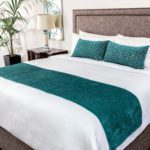 Custom Top of Bed: Berserk Throw Pillows in Ocean, Jewel Bed Scarf in Tourmaline, and Mt. Auburn Duvet in White Oak