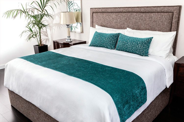 Custom Top of Bed: Berserk Throw Pillows in Ocean, Jewel Bed Scarf in Tourmaline, and Mt. Auburn Duvet in White Oak