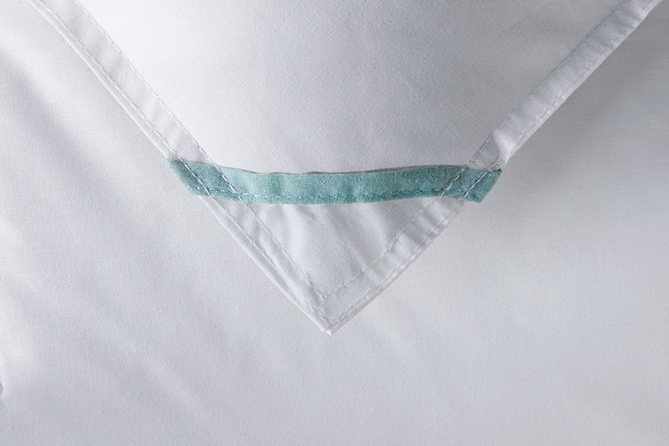 Detail of Elevations comforter showing the color coded EZ ID loop that helps for quick size identification.