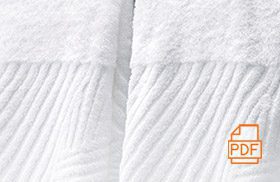 Detail image of of an Elevations towel with a PDF graphic indicating it is a link to a PDF about Elevations bath towels.