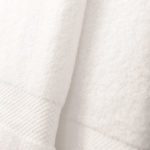 Detail of A stack of EuroClassique hotel bath towels.
