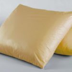 This image features two Peach colored Sonata Healthcare Pillows.