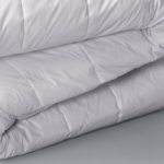 A close-up of the folded interloft blanket.