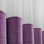 This image shows a On The Right Track Privacy Curtain: The pattern is Bezel and the color-way is Elderberry.