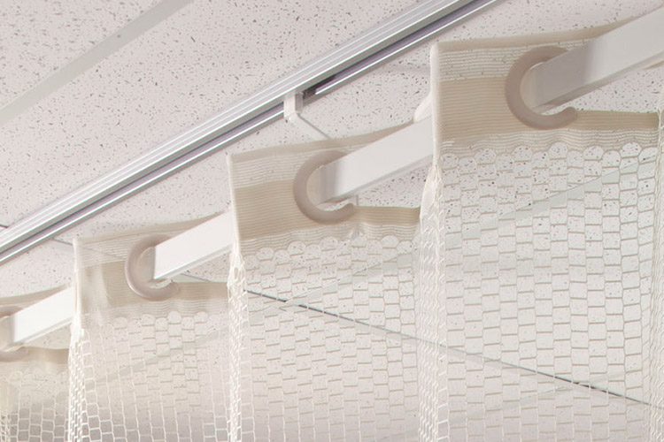 On The Right Track Privacy Curtains are shown here with Flex-On Rings.