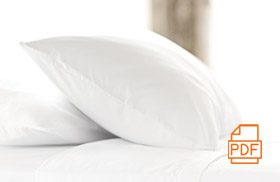 Image of pillows on a bed with a PDF icon superimposed with a link to a pillow guide.
