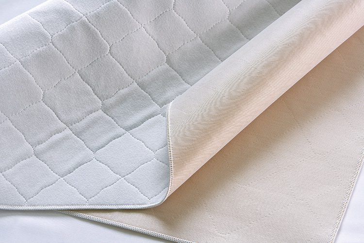 A detail shot of PolyLite underpads. So soft these incontinence pads are often preferred for comfort.