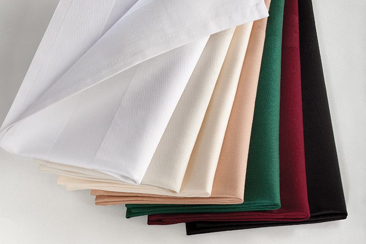 A fanned stack of folded Satin Band cloth napkins in a variety of colors.