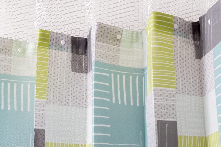 A detail shot of a vibrant patterned snap on hospital privacy curtain.