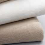 Stack of 3 100% polyester blankets wholesale