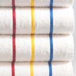 Image of white pool towel with colorful primary stripes.
