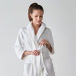 A woman wearing a Heidi Weisel robe.