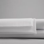 A stack of versatility fitted sheets