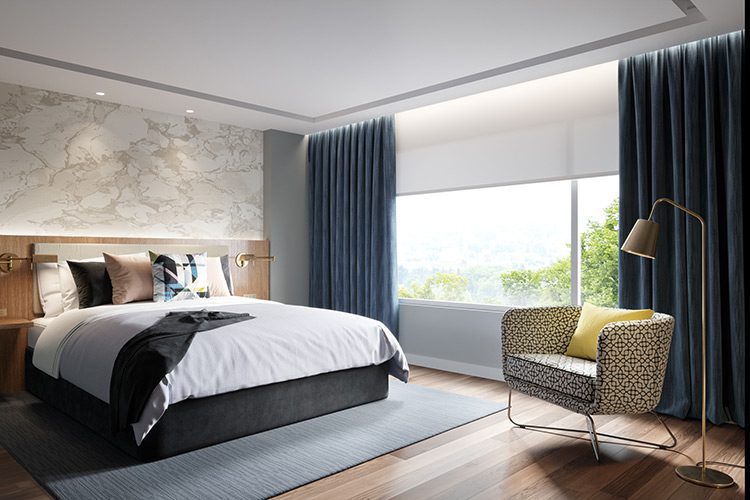 A luxury hotel guest room featuring a well made bed and a large wall-to-wall window with a scenic view.