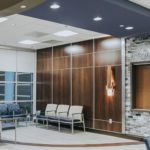 A well furnished and decorated patient waiting room.