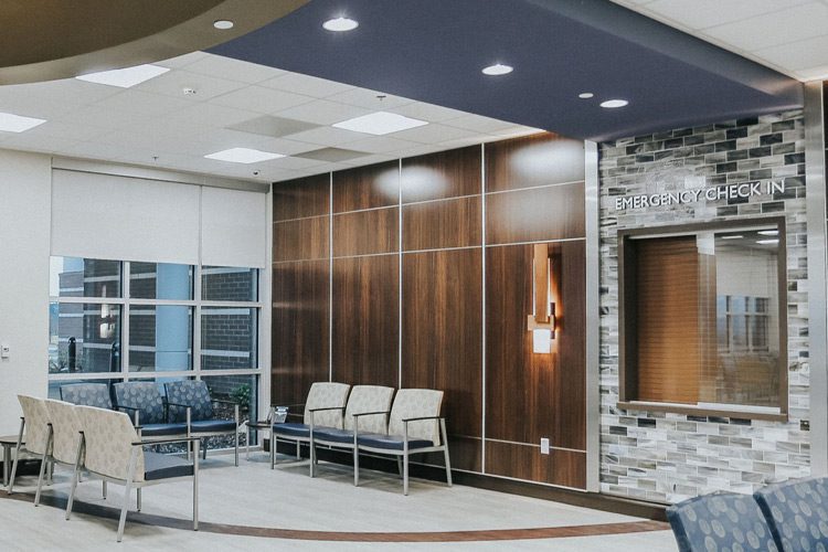 A well furnished and decorated patient waiting room.