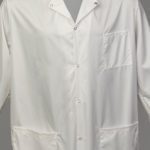 A ComPel® Lab Coat on a grey background.